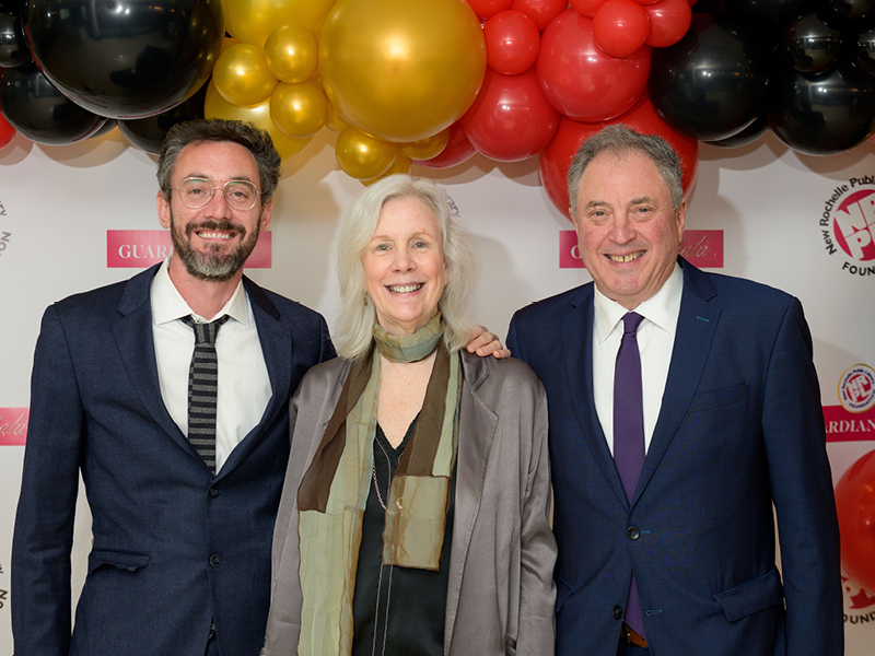 Honoree Nancy Paulsen 
with son Sam and husband David Friend.